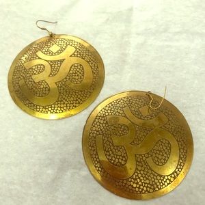 Gold Om earrings.